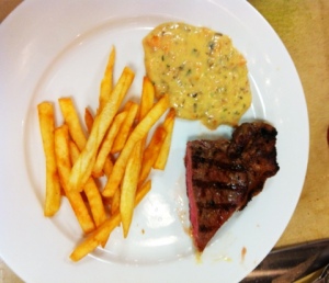 Strip Steak with French Fries and Chevron Sauce